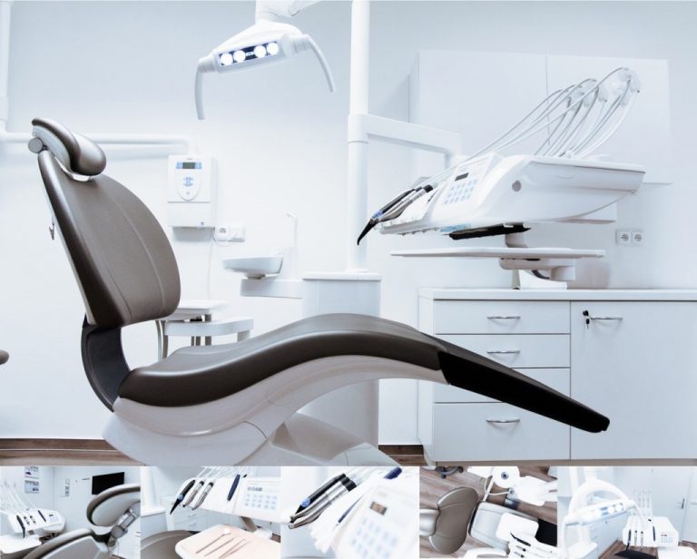 a sanitized black dental chair in a patient room at a dental office